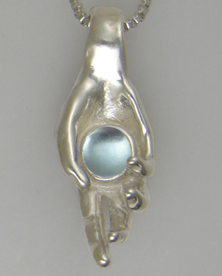 Sterling Silver Healing Hand Pendant With Blue Topaz